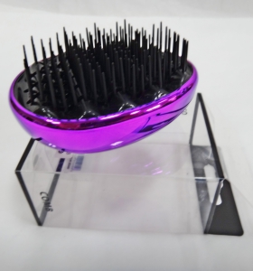 Расческа  (массажная ) .